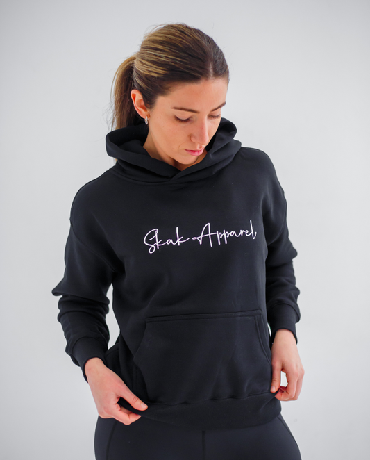 Experience ultimate warmth and style with our Ladies Signature Hoodie in Black, designed to keep you snug and fashionable