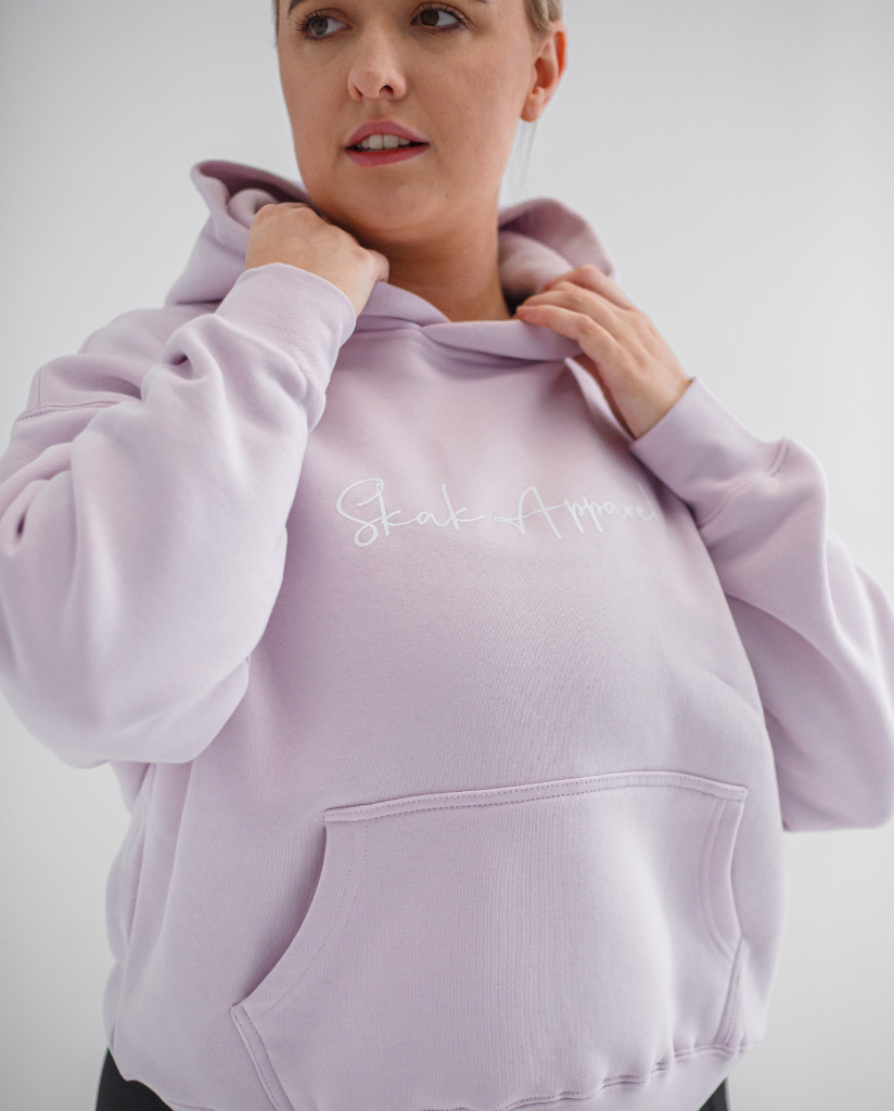 Experience ultimate warmth and style with our Ladies Signature Hoodie in Orchid, designed to keep you snug and fashionable