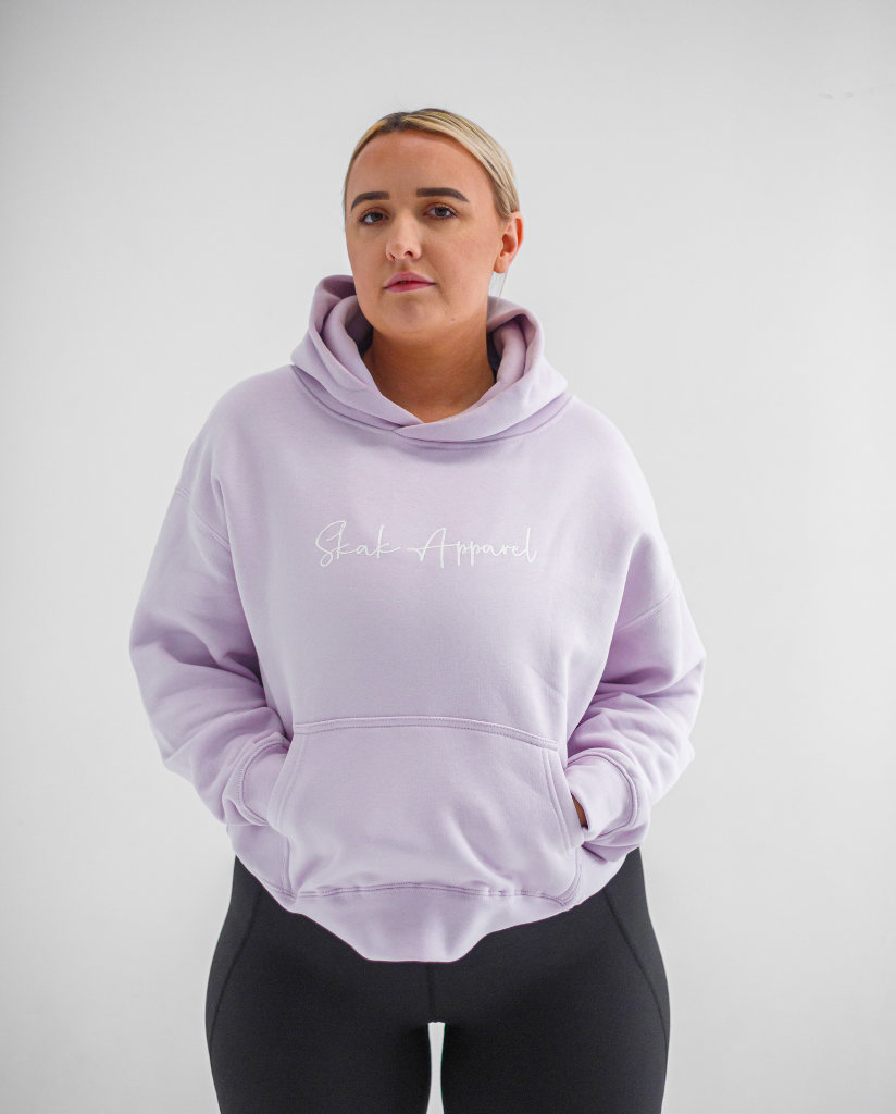 Experience ultimate warmth and style with our Ladies Signature Hoodie in Orchid, designed to keep you snug and fashionable